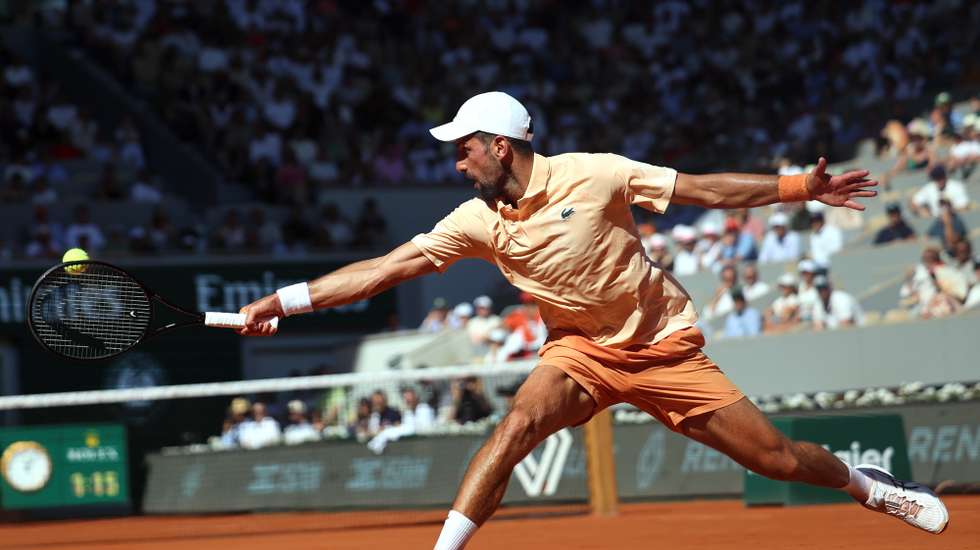epa12998213 Novak Djokovic of Serbia in action during his Men's 2nd round match against Valentin Royer of France at the French Open Grand Slam tennis tournament at Roland Garros in Paris, France, 27 May 2026.  EPA/CHRISTOPHE PETIT TESSON