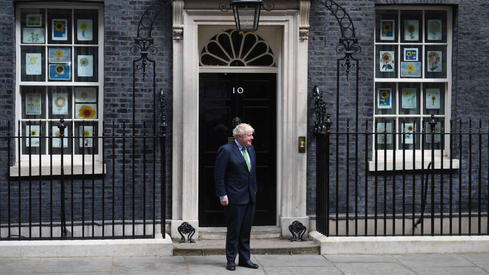epa09927862 Britain's Prime Minister Boris Johnson departs 10 Downing Street to greet his Japanese counterpart in London, Britain, 05 May 2022.  EPA/NEIL HALL
