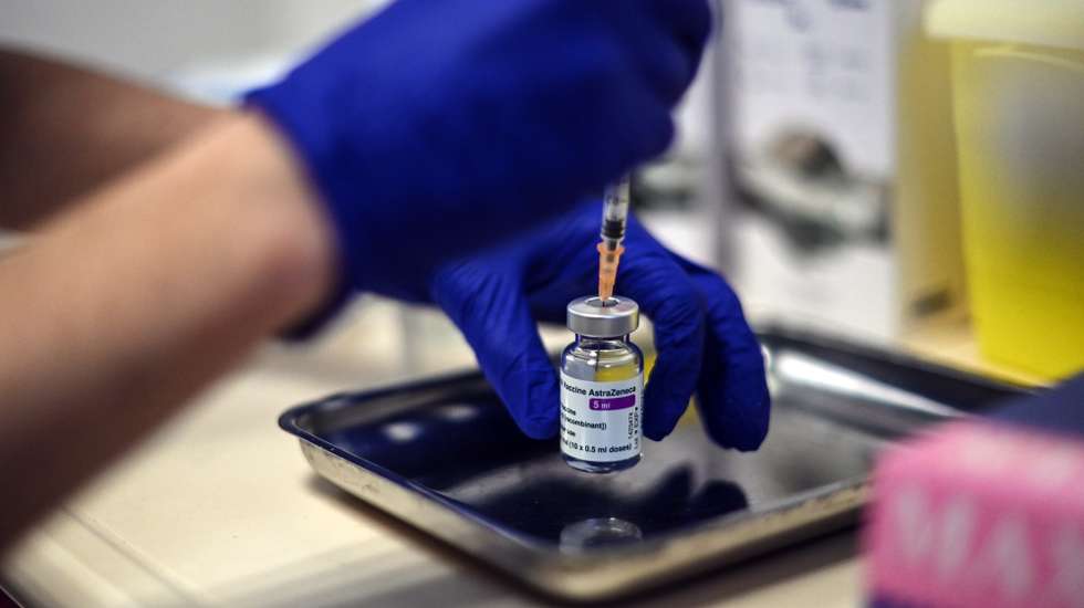 epa08991615 A nurse prepares a dose of the AstraZeneca/Oxford Covid-19 vaccine at the Edouard Herriot hospital in Lyon, France, 06 February 2021. The top French health authority on 02 February 2021 cleared AstraZeneca's Covid-19 vaccine for use, but advised against giving it to people over 65.  EPA/OLIVIER CHASSIGNOLE / POOL  MAXPPP OUT