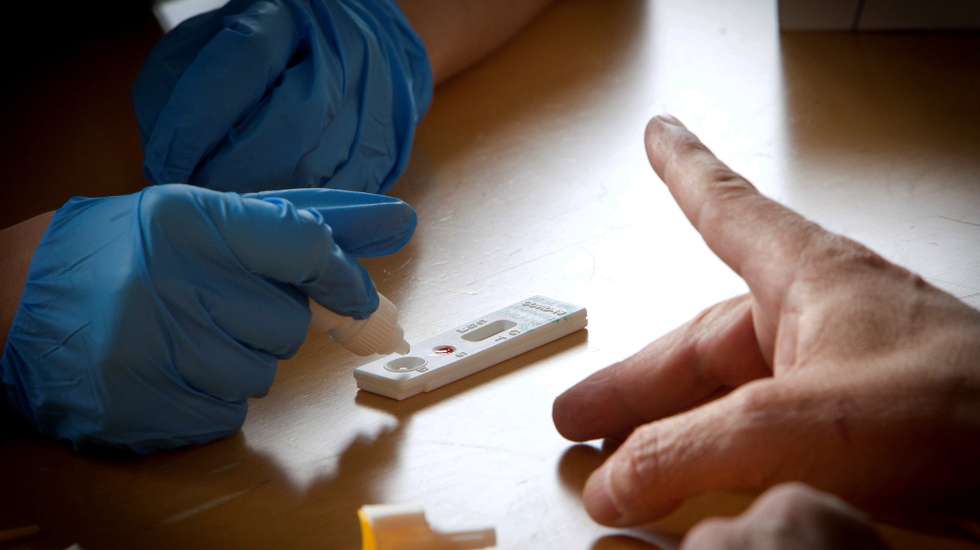 epa08761504 A nursing student performs a SARS-CoV-2 quick test at the University of Vigo campus in Vigo, Galicia, north-western Spain, 21 October 2020. The 4th year Nursing students of the University of Vigo are in charge of carrying out the SARS-CoV-2 quick test to the students and teachers.  EPA/Salvador Sas