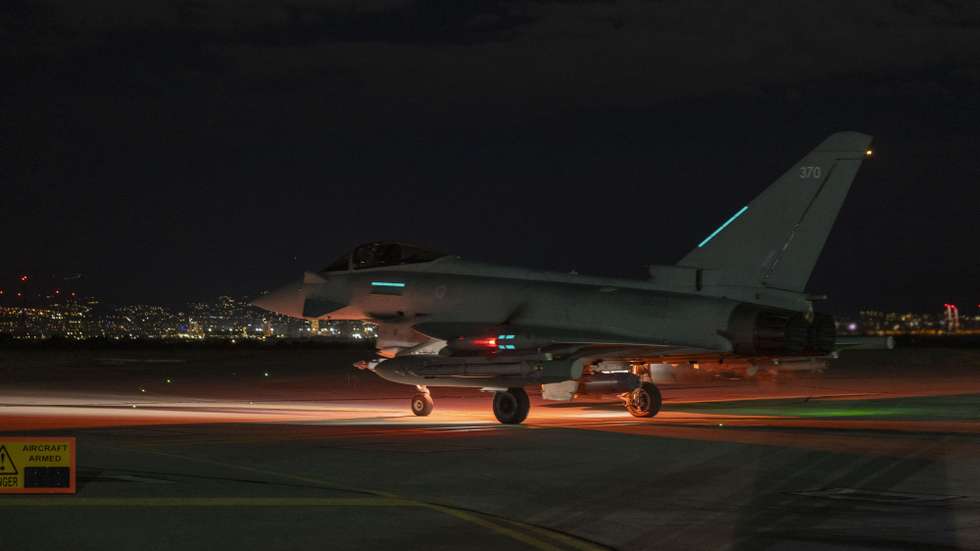 epa12624492 A handout photo made available by the Royal Air Force (RAF) on 03 January 2025 shows a Royal Air Force Typhoon aircraft preparing to take off at an undisclosed location in the Middle East. RAF Typhoon FGR4s, supported by a Voyager refuelling tanker, joined French aircraft in a joint strike; the aircraft used Paveway IV guided bombs to target a number of access tunnels down to an underground facility near Palmyra in Syria, against the Daesh group on 03 January 2026.  EPA/SGT LEE GODDARD HANDOUT HANDOUT EDITORIAL USE ONLY/NO SALES