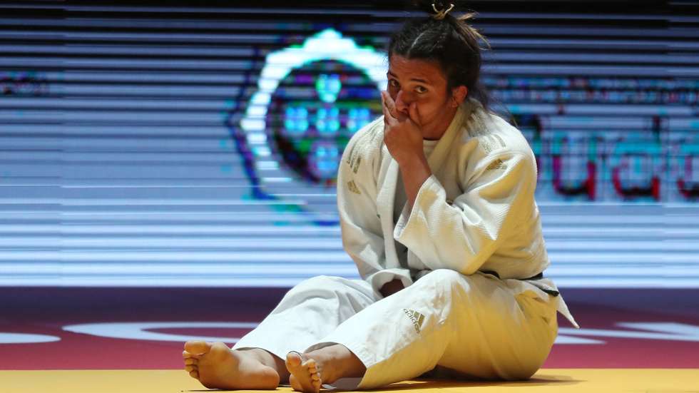 epa09141933 Barbara Timo of Portugal cryes after winning the bronze medal match against Lara Cvjetko of Croatia in woman's -70kg category at the European Judo Championships in Lisbon, Portugal, 17 April 2021.  EPA/NUNO VEIGA