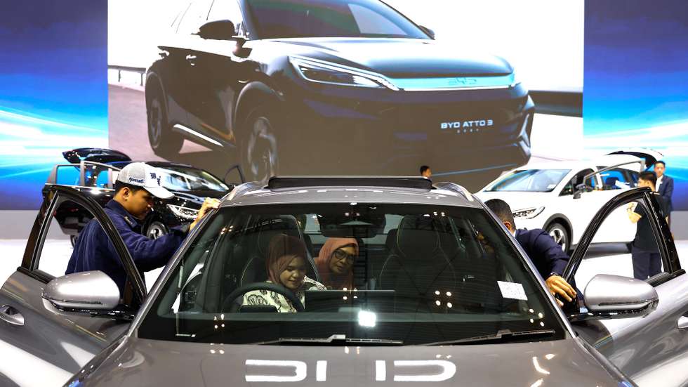 epa13141117 Visitors sit in an electric car Atto 3 made by Chinese automotive manufacturer BYD at the Gaikindo Indonesia International Auto Show (GIIAS) 2026 in Tangerang, Banten province, Indonesia, 30 July 2026. The annual auto show runs from 30 July to 09 August 2026.  EPA/MAST IRHAM