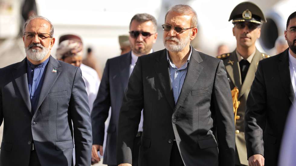 epa12722839 A handout photo made available by Iran's Supreme National Security Council office shows Secretary of the Supreme National Security Council Ali Larijani (C) arriving in Muscat, Oman, 10 February 2026. Larijani is visiting Oman following a recent round of talks between Iran and US held in the country.  EPA/IRAN'S NATIONAL SECURITY COUNCIL HANDOUT HANDOUT EDITORIAL USE ONLY/NO SALES