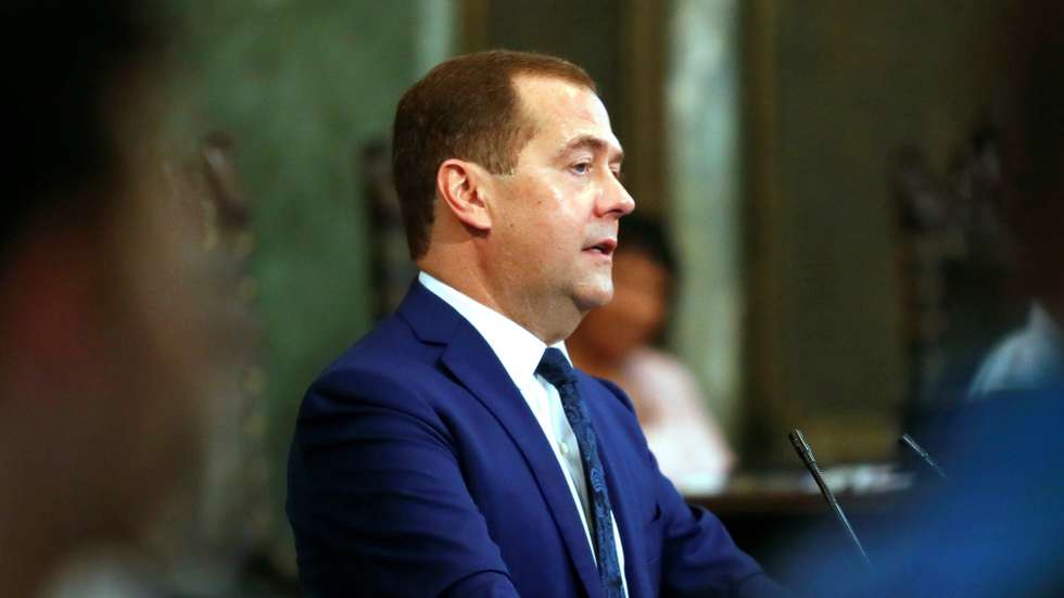epa07895736 Russian Prime Minister Dmitri Medvedev delivers a speech during the ceremony where he has been invested with the title of Doctor Honoris Causa in Political Science, in Havana, Cuba, 04 October 2019. Medvedev is on his second day of an official visit to the island.  EPA/YANDER ZAMORA
