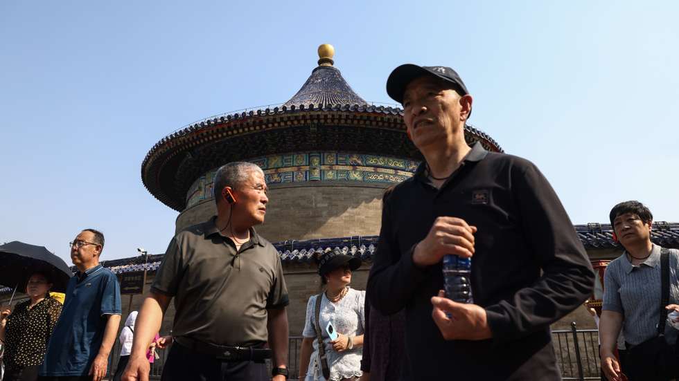 epa12949267 Visitors walk at the Temple of Heaven in Beijing, China, 12 May 2026. US President Donald Trump will pay a state visit to China from 13 to 15 May.  EPA/WU HAO