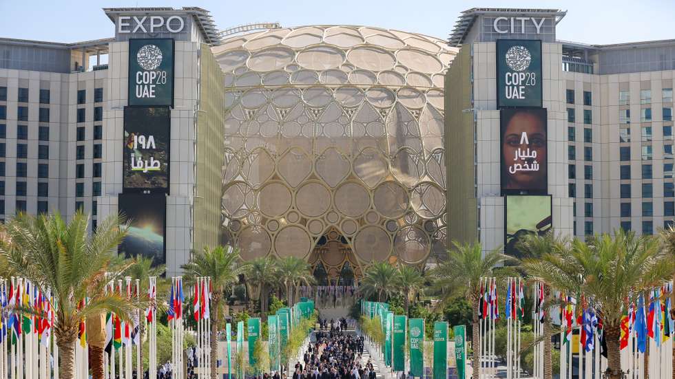 epa11005302 A handout photo made available by the UN Press Office shows leaders walk after a family photo session at the UN Climate Change Conference COP28, in Dubai, United Arab Emirates, 01 December 2023. The 2023 United Nations Climate Change Conference (COP28), runs from 30 November to 12 December, and is expected to host one of the largest number of participants in the annual global climate conference as over 70,000 estimated attendees, including the member states of the UN Framework Convention on Climate Change (UNFCCC), business leaders, young people, climate scientists, Indigenous Peoples and other relevant stakeholders will attend.  EPA/NEVILLE HOPWOOD/ UN PRESS OFFICE / HANDOUT  HANDOUT EDITORIAL USE ONLY/NO SALES HANDOUT EDITORIAL USE ONLY/NO SALES