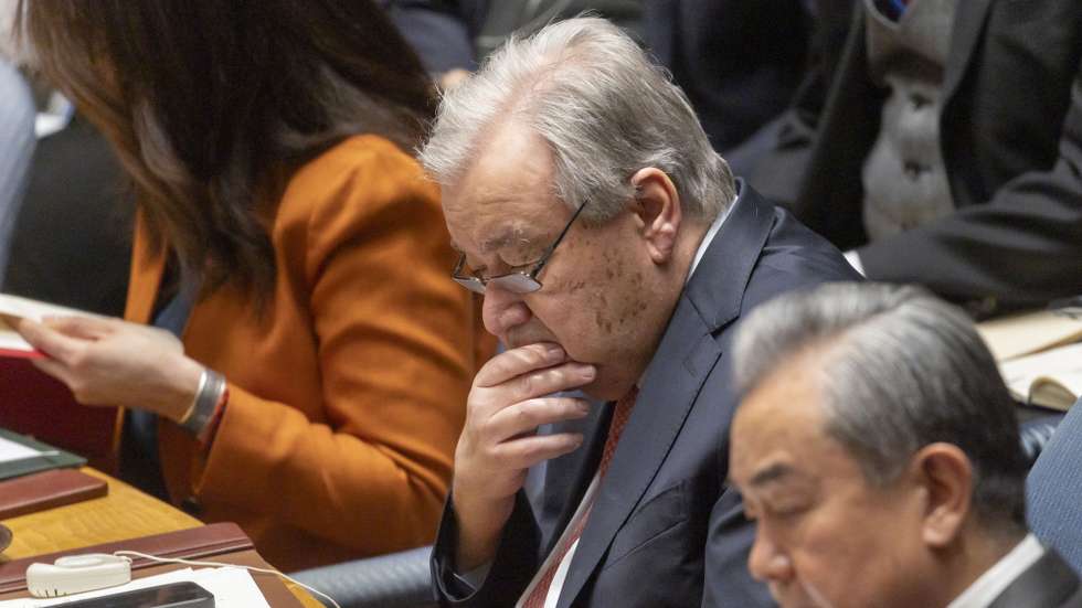 epa11905501 China's Foreign Minister Wang Yi (R) and UN Secretary-General Antonio Guterres (C) attend a United Nations Security Council on 'Maintenance of international peace and security: Practicing multilateralism, reforming and improving global governance' at the United Nations (UN) headquarters in New York, New York, USA, 18 February 2025.  EPA/JUSTIN LANE