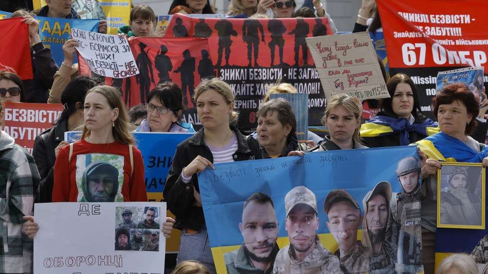 epa11276205 Ukrainians attend the 'Missing in action is not a verdict!' rally in downtown Kyiv, Ukraine, 13 April 2024, amid the Russian invasion. The rally called on authorities to locate and return Ukrainian servicemen who went missing in action, as well as prisoners of war from Russian captivity.  EPA/SERGEY DOLZHENKO
