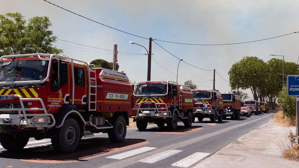 epa13080067 Fire engines arrive to help in extinguishing a wildfire burning in Sainte-Valiere, Aude department, southern France, 02 July 2026. A large wildfire has been raging in southern France since 01 July, forcing scores of people to be evacuated, emergency services said.  EPA/CHLOE REULET