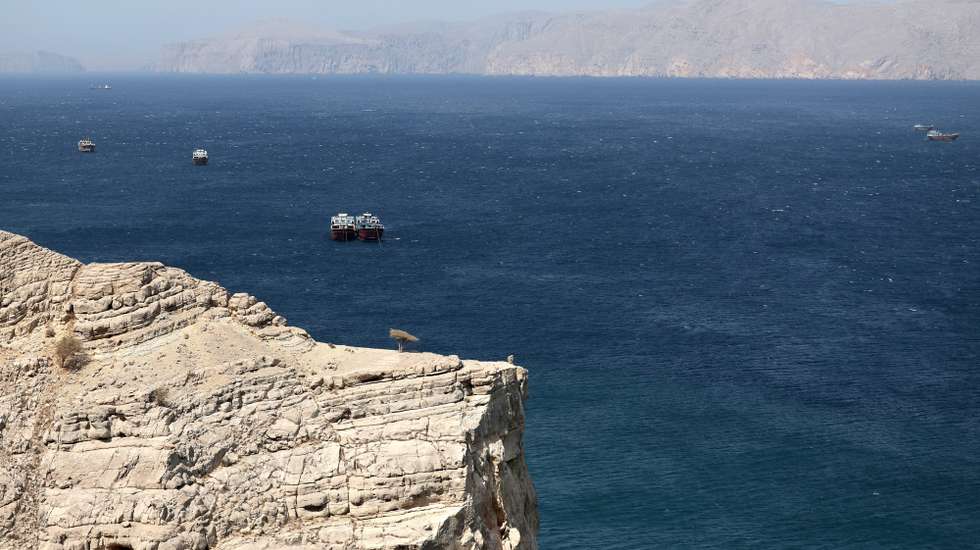 epa12194513 Ships in the Strait of Hormuz as seen from Khasab, Musandam Governorate, Oman, 24 June 2025. The Iranian parliament approved a measure to close the Strait of Hormuz following US strikes on three of Iran's key nuclear sites on 22 June 2025. Israel and Iran have been exchanging fire since Israel launched strikes across Iran on 13 June 2025.  EPA/ALI HAIDER