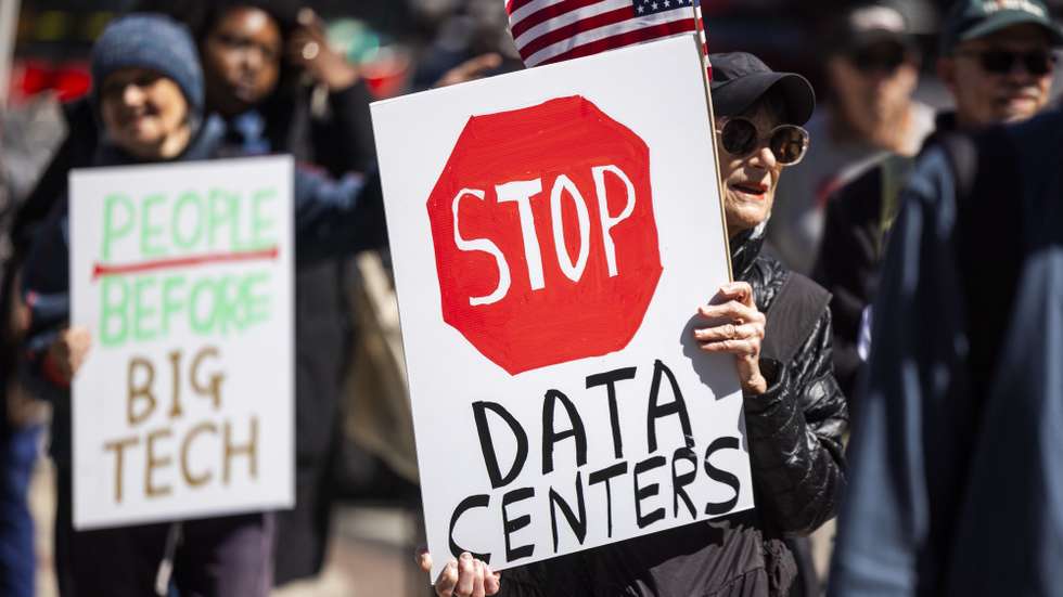 epa12905109 Activists protest the environmental consequences of data center expansion outside a data center conference in Washington, DC, USA, 21 April 2026. Activists equated the centers, which are increasing energy demands across the US, to 'a second coal industry.'  EPA/JIM LO SCALZO