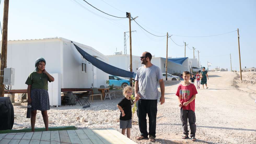 epa13206918 Israeli residents of new housing units walk on a street during the inauguration of the new Israeli outpost settlement Maale Arugot, in the Gush Etzion settlement block near the West Bank Palestinian city of Bethlehem, 02 September 2026.  EPA/ABIR SULTAN
