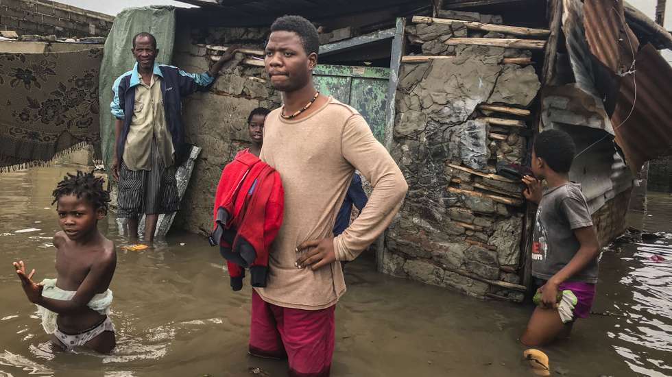 A man observes the damage caused  after the passage of Tropical Cyclone Eloise at a street in the city of Beira, Mozambique, 23 January 2021.The city of Beira presented signs of destruction in all streets on the day, with several flooded neighborhoods with residents circulating with the water around the waist at some points following the passage of Tropical Cyclone Eloise. ANDRE CATUEIRA/LUSA