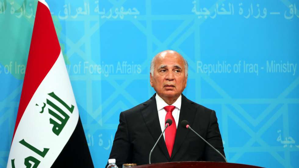 epa09250678 Iraqi Foreign Minister Fuad Hussein speaks during a joint press conference with his Danish counterpart at the Iraqi foreign ministry in Baghdad, Iraq, 06 June 2021. Kofod is meeting with Iraqi Prime Minister, the President and several officials to discuss bilateral relations between the two countries during his official visit to Iraq.  EPA/AHMED JALIL