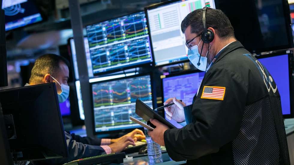 epa08798733 A handout photo made available by the New York Stock Exchange (NYSE), showing 
traders working at the New York Stock Exchange (NYSE) on 04 November 2020, while the US presidential election awaits a final result. The 2020 Presidential Election result remains undetermined as votes continued to be counted in several key battleground states.  EPA/COURTNEY CROW HANDOUT  HANDOUT EDITORIAL USE ONLY/NO SALES