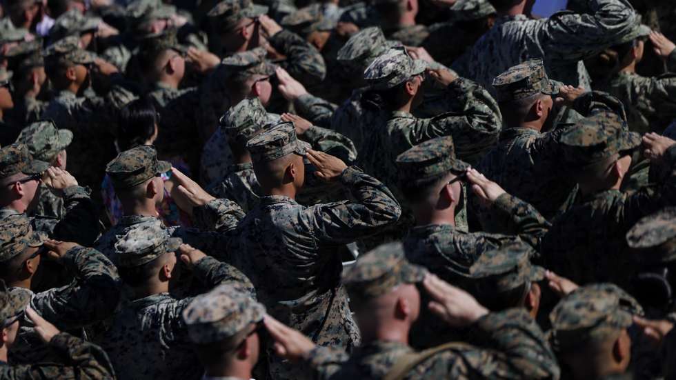epa12463604 US Marines salute during the 'America's Marines 250: From Sea to Shore-A Review of Amphibious Strength' event, part of the celebrations marking the U.S. Marine Corps 250th anniversary at Camp Pendleton in Oceanside, California, USA, 18 October 2025.  EPA/CAROLINE BREHMAN