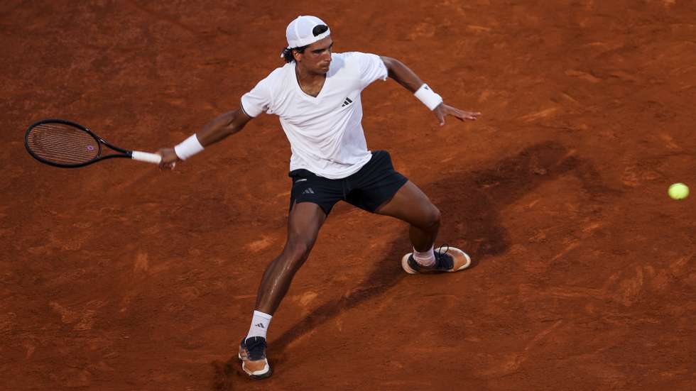 Henrique Rocha from Portugal in action against Pedro Martinez from Spain at the 32 round match of Estoril Open Tennis tournament in Estoril, on the outskirts of Lisbon, Portugal, 20 of July 2026. MIGUEL A. LOPES/LUSA