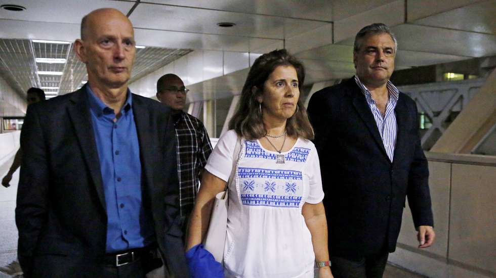 epa08517967 (FILE) - The ambassador of Spain in Venezuela Jesus Silva (R), the ambassador of the Netherlands in Venezuela Norbert Braakhuis (L), and the ambassador of the European Union in Venezuela Isabel Brilhante (C), leave the Simon Bolivar International Airport, where they were waiting for a mission of members of European Parliament (MEPs) to visit the country, in Caracas, Venezuela, 17 February 2019 (reissued 30 June 2020). Venezuelan President Maduro on 29 June 2020 announced his decision to expel the Ambassador of the European Union (EU) to Venezuela, Isabel Brilhante Pedrosa, in the next 72 hours. The move came right after the EU imposed sanctions on eleven Venezuelan officials for considering acting against the rule of law in the country.  EPA/LEONARDO MUNOZ *** Local Caption *** 54993388