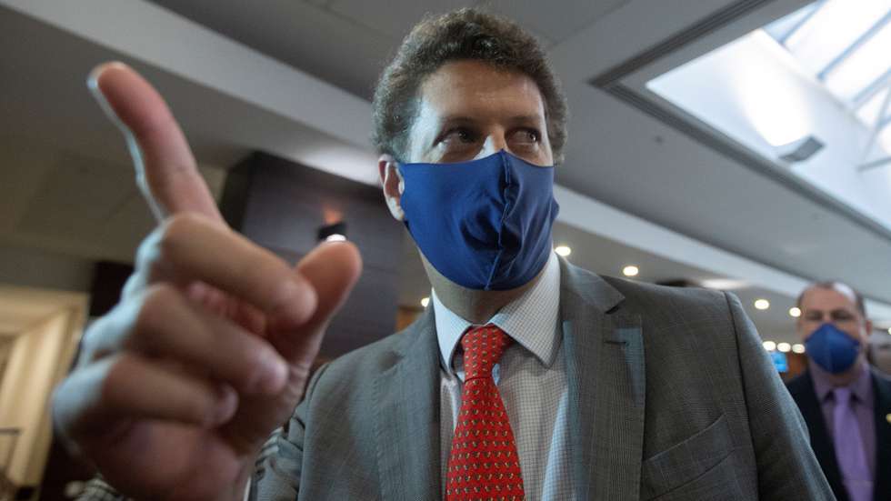 epa09212612 The Brazilian Minister of the Environment Ricardo Salles speaks with the press after leaving the event 'Path to the sustainable development of the solid waste industry in Brazil', in Brasilia, Brazil, 19 May 2021. The Brazilian Federal Police began an operation on 19 May in several cities of the country to determine the degree of participation of the Minister of the Environment, Ricardo Salles, and other environmental authorities in a scheme for the illegal export of wood to Europe and the United States.  EPA/Joedson Alves