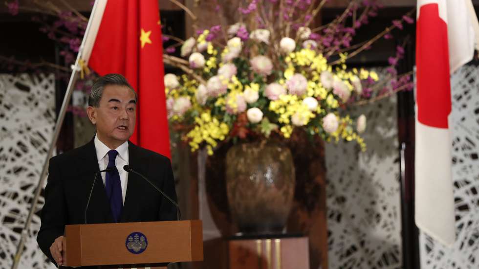 epa08838796 China  State Councilor and Foreign Minister Wang Yi attends a joint news conference with his Japanese counterpart Toshimitsu Motegi (not in picture), amid the coronavirus disease (COVID-19) outbreak, in Tokyo, Japan, 24 November 2020.  EPA/ISSEI KATO / POOL