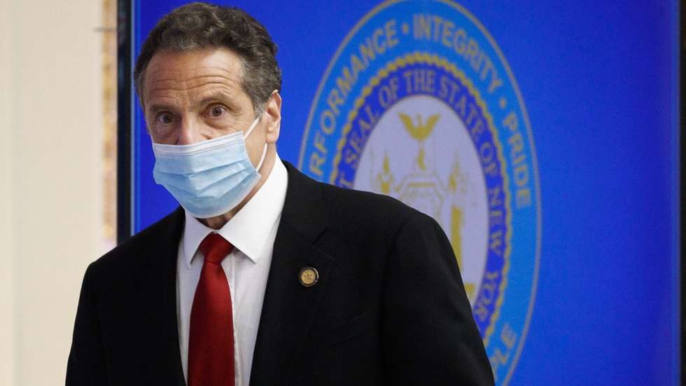 epa08445191 New York Governor Andrew Cuomo arrives for his daily briefing in a conference room at the New York Stock Exchange in New York, New York, USA, on 26 May 2020. Today is the first day that the stock exchange is reopen for in-person trading after the building was closed in March due to the coronavirus pandemic.  EPA/JUSTIN LANE