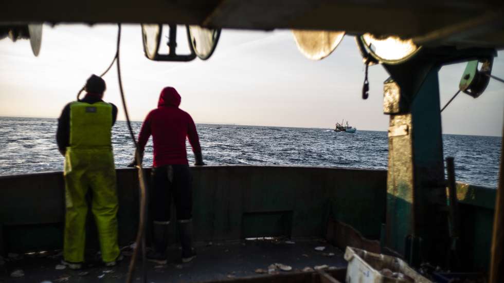 epa08411756 Ship's crew members Jean-Baptiste (L) and Tomy (R) stand onboard the fishing boat Gros Minet near Le Havre, France, 07 May 2020 (issued 09 May 2020). The French fishing boat Gros Minet has been working since the beginning of the confinement in order to provide fish as France was under lockdown measures taken in an attempt to stop the widespread of the SARS-CoV-2 coronavirus which causes the Covid-19 disease.  EPA/YOAN VALAT  ATTENTION: This Image is part of a PHOTO SET