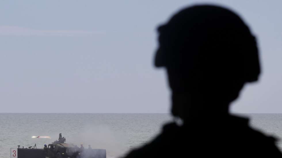 epa10723379 Taiwan militarily Humvee armed with US-made TOW A2 missiles fires at a target during the missile shooting exercises in Fangshan, Pingtung county, Taiwan, 03 July 2023. In the past year, Taiwan has increased production of its anti-ship and air defense missiles amid rising tensions with China.  EPA/RITCHIE B. TONGO