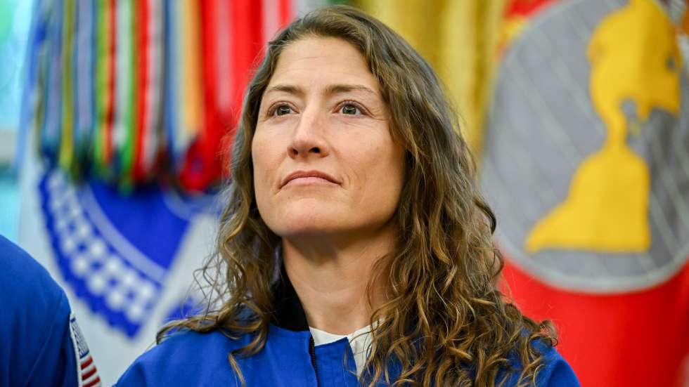 epa12922410 Artemis II mission specialist Christina Koch looks on during a meeting of US President Trump with members of the Artemis II mission in the Oval Office of the White House in Washington, DC, USA, 29 April 2026. NASA’s four Artemis astronauts swung behind the moon in a journey that shattered space travel distance records and brought people the closest they’ve been to the lunar surface in more than 50 years.  EPA/Graeme Sloan / POOL