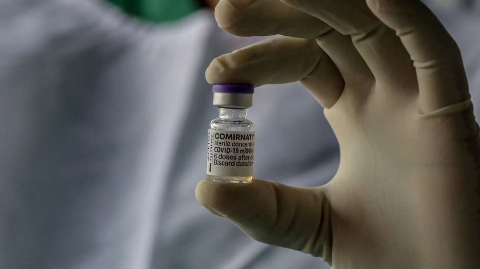 epa09328159 A health worker holds a vial of the Pfizer- BioNTech Comirnaty Covid-19 vaccine at a vaccine center in Colombo, Sri Lanka, 07 July 2021. Following approval by the World Health Organisation for Pfizer- BioNTech and Moderna vaccines to be administered as the second dose for those who have received Astra-Zeneca as the first dose, Sri Lanka is the third South Asian country to receive and begin the vaccination process. The Maldives and Bangladesh are the first and second countries respectively to receive this vaccine through the WHOâ€™s COVAX facility, according to the UNICEF. Sri Lanka is currently using Oxford AstraZeneca, China's Sinopharm, Russian Sputnik V, Covid -19 vaccines for the Vaccine rollout. Meanwhile, Sri Lanka is currently experiencing a serious shortage of Oxford AstraZeneca (Covishield) vaccine, to be given as a second dose.  EPA/CHAMILA KARUNARATHNE