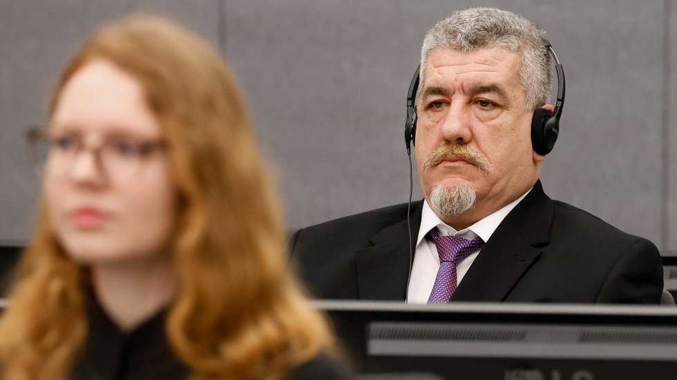 epa10481343 Kosovo ex-guerrilla Pjeter Shala looks on as he stands trial at the Kosovo Specialist Chambers in The Hague, Netherlands, 21 February 2023. Shala, also known as 'Commander Wolf', fought alongside the Kosovo Liberation Army (KLA), and is currently facing trial for wartime crimes including arbitrary detentions, torture and murder.  EPA/PIROSCHKA VAN DE WOUW / POOL