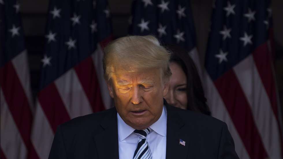 epa09329217 Former US President Donald J. Trump arrives for a press conference at Trump National Golf Club Bedminster in Bedminster, New Jersey, USA, 07 July 2021. At the event, Trump announced plans to file a class action lawsuit against Facebook and Twitter for alleged censorship.  EPA/JUSTIN LANE