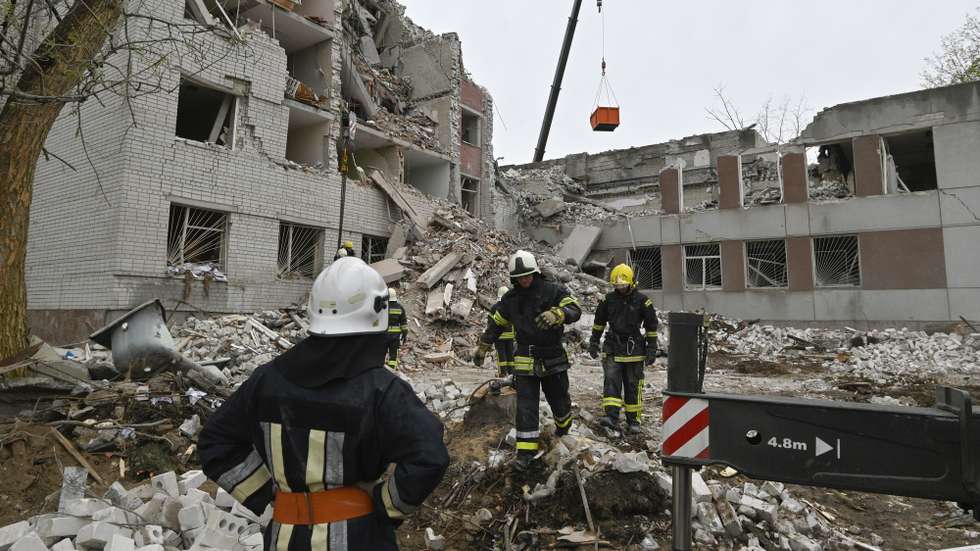 epa11284585 Ukrainian rescuers work at the site of a missile strike in Chernihiv, northern Ukraine, 17 April 2024, amid the Russian invasion. At least 17 people were killed and 60 others injured, including three children, following a Russian missile strike in Chernihiv, the State Emergency Service of Ukraine (SESU) said, adding that a search and rescue operation was ongoing. A social infrastructure facility, a hospital, and several residential high-rise buildings were damaged as a result of the morning rocket attack in Chernihiv, north of Kyiv, Ukrainian officials said.  EPA/SERHII OLEXANDROV