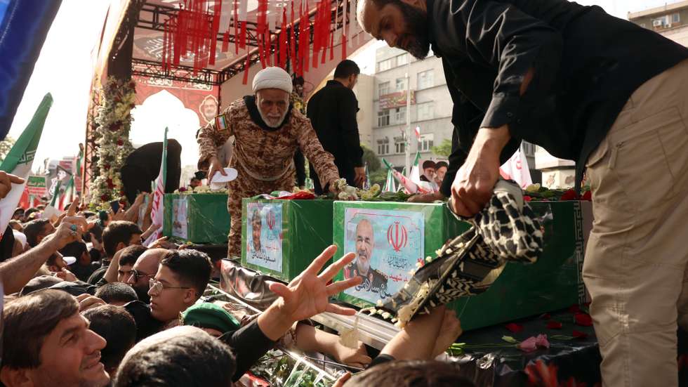 epaselect epa12202174 Iranians attend a funeral ceremony for Iranian IRGC generals and scientists who were killed in recent Israeli airstrikes, in Tehran, Iran, 28 June 2025. Israel has been conducting a campaign across Iran since 13 June, targeting nuclear, military, and energy facilities, prompting Iran to launch retaliatory waves of missiles and drones toward Israel.  EPA/ABEDIN TAHERKENAREH