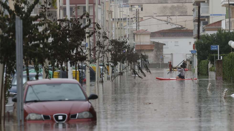 epa13315370 Streets flooded following the passage of Storm Adam in Guardamar de la Safor, Valencia, Spain,19 October 2026. Adam Storm has already claimed two lives and is causing 'extraordinary' rainfall and severe flooding in Valencia and Alicante, with rainfall totals exceeding 600 litres per square metre, rivers bursting their banks and people trapped on rooftops – a situation that has led the Valencian Regional Government to prepare a lockdown order for the affected municipalities.  EPA/Manuel Bruque