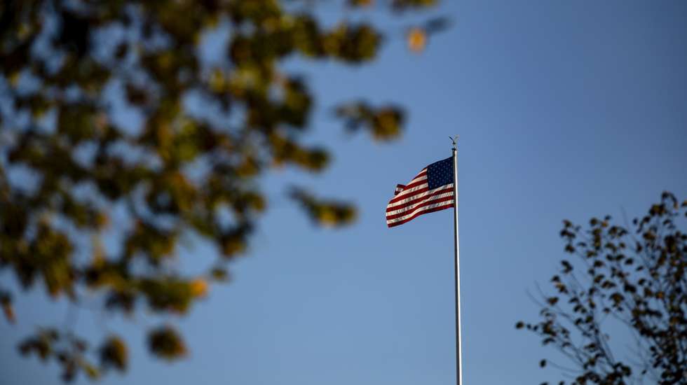 epa08718864 The sun begins to set over the White House in Washington, DC, USA, 03 October 2020. US President Donald J. Trump stays at Walter Reed National Military Medical Center for the treatment of COVID-19 in Bethesda, Maryland.  EPA/SAMUEL CORUM