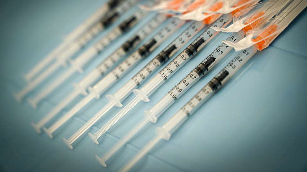 epa09051507 Syringes filled with Covid-19 vaccine in the vaccination center at the Ferrari Orsi Barracks in Caserta, headquarters of the Bersaglieri Garibaldi Brigade, one of the largest centers for the administration of the vaccine against Covid-19, in Caserta, southern Italy, 04 March 2021.  EPA/CESARE ABBATE