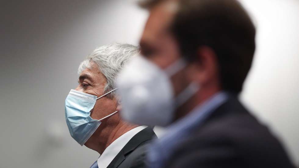 epa09124507 The defendant and former Prime Minister Jose Socrates (R) before the instructional decision session of the high-profile corruption case known as Operation Marques, at the Justice Campus in Lisbon, Portugal, 09 April 2021. Operation Marques has 28 defendants - 19 people and 9 companies - including former Prime Minister Jose Socrates, banker Ricardo Salgado, businessman and friend of Socrates Carlos Santos Silva, and senior executives of Portugal Telecom, and is related to crimes of active and passive corruption, money laundering, document forgery, and tax fraud.  EPA/MARIO CRUZ / POOL