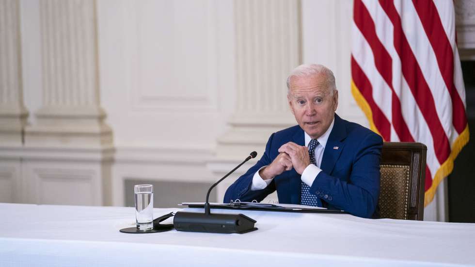 epa09398542 US President Joe Biden delivers remarks ahead of a meeting with Asian American, Native Hawaiian, and Pacific Islander (AANHPI) civil rights leaders in the State Dining Room of the White House in Washington, DC, USA, 05 August 2021.  EPA/SARAH SILBIGER / POOL