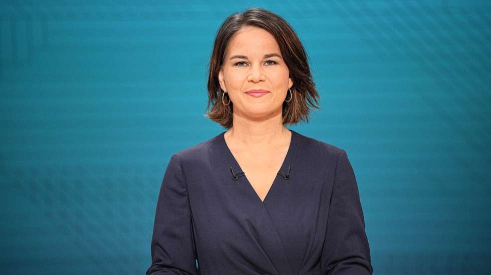 epa09464155 Green party (Buendnis90/Die Gruenen, Alliance 90/The Greens) co-chairwoman and top candidate for the upcoming federal elections Annalena Baerbock pictured in the studio during the ARD/ZDF TV station live recording of the TV debate 'The Truel. Three-way fight for the chancellorship' ('Das Triell. Dreikampf ums Kanzleramt') in Berlin, Germany, 12 September 2021. For the second time prior to the general elections on 26 September 2021, the three candidates of Greens, Christian Democrats and Social Democrats, meet in a 'truel', for a live TV debate in the evening of 12 September 2021.  EPA/Michael Kappeler / POOL