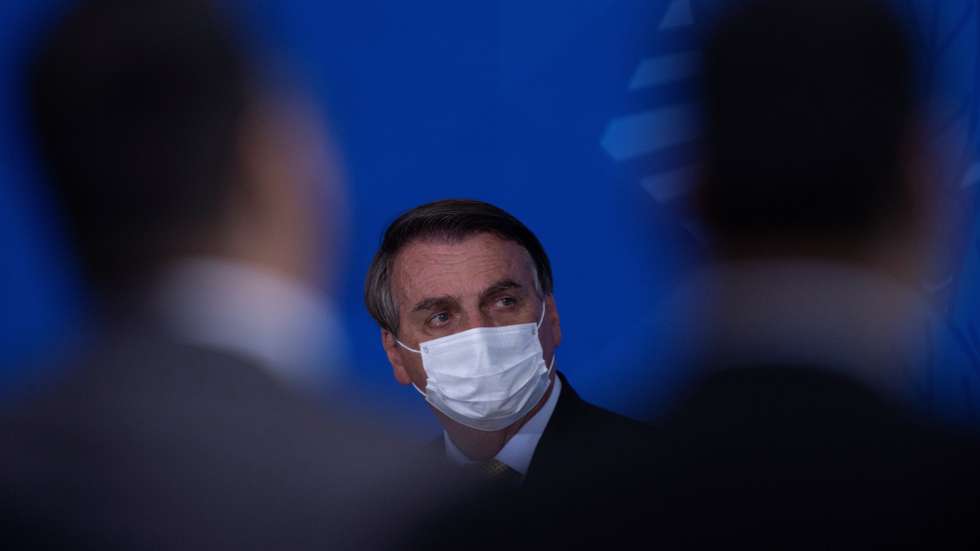 epa09312306 President of Brazil, Jair Bolsonaro, participates in a launch ceremony of the new registration system for Professional Fishermen and Rede Pesca Brasil, at the city's Planalto Palace from Brasilia, Brazil 29 June 2021. The Brazilian Minister of Health, Marcelo Queiroga, announced that the contract signed for the purchase of the Indian vaccine against covid-19, Covaxin, will be 'on hold' until complaints of irregularities in these negotiations are clarified.  EPA/Joedson Alves
