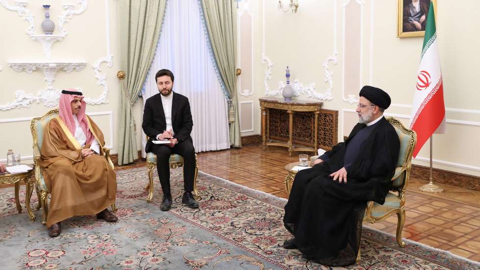 epa10697041 A handout photo made available by the Iranian Presidency shows Iranian President Ebrahim Raisi (R) talking to Saudi Foreign Minister Feisal Bin Farhan (L) during a meeting in Tehran, Iran, 17 June 2023. Saudi Arabia and Iran agreed to resume diplomatic relations in March 2023 following a Chinese-brokered deal ending years of disagreement, including those in Yemen, Syria, and Lebanon.  EPA/IRANIAN PRESIDENCY / HANDOUT  HANDOUT EDITORIAL USE ONLY/NO SALES