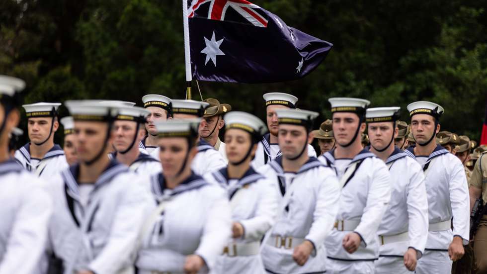 epa11104563 ADF Tri-Service Royal Guard of Honor and members of the Royal Australian Navy Band attends a flag raising ceremony at Government House on Australia Day in Melbourne, Australia, 26 January 2024. Australia Day, the official national day of Australia, is celebrated every year on 26 January. It commemorates the 1788 landing of the First Fleet and the raising of Great Britain's Union. Some people view it as a day of reflection, suggesting a change of date or even abolishing the holiday altogether. While changing the date has minority support, polls show some backing, especially among Australians under 30.  EPA/DIEGO FEDELE NO ARCHIVING AUSTRALIA AND NEW ZEALAND OUT