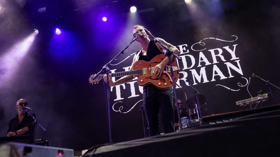 Paulo Furtado, The Legendary Tigerman atua durante o primeiro dia do festival de música Vilar de Mouros, em Vilar de Mouros, 21 de agosto de 2025. JOSÉ COELHO/LUSA