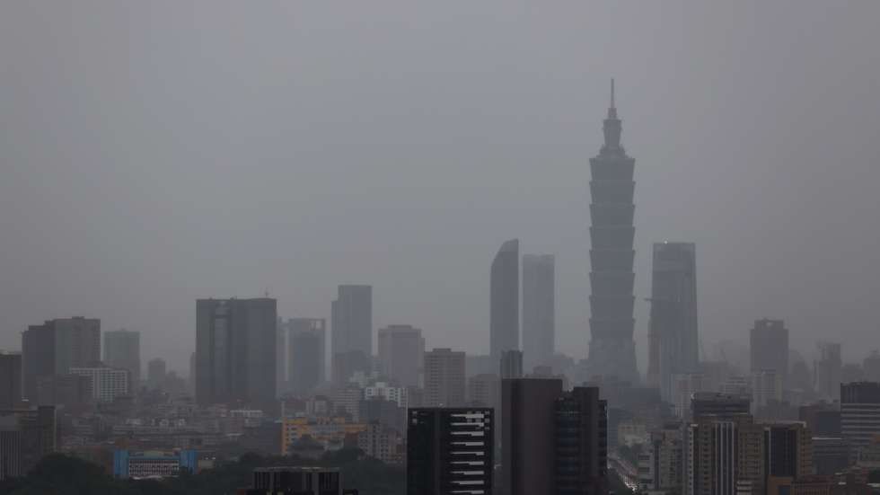 epa12221702 A view of high rise buildings during rain in Taipei, Taiwan, 07 July 2025. Typhoon Danas hit Budai Township, Chiayi County, Taiwan, late Sunday, 06 July, weakening to a tropical storm by Monday morning. The Central Emergency Operation Center reported two deaths in Tainan and 334 injuries due to strong winds and heavy rain.  EPA/RITCHIE B. TONGO