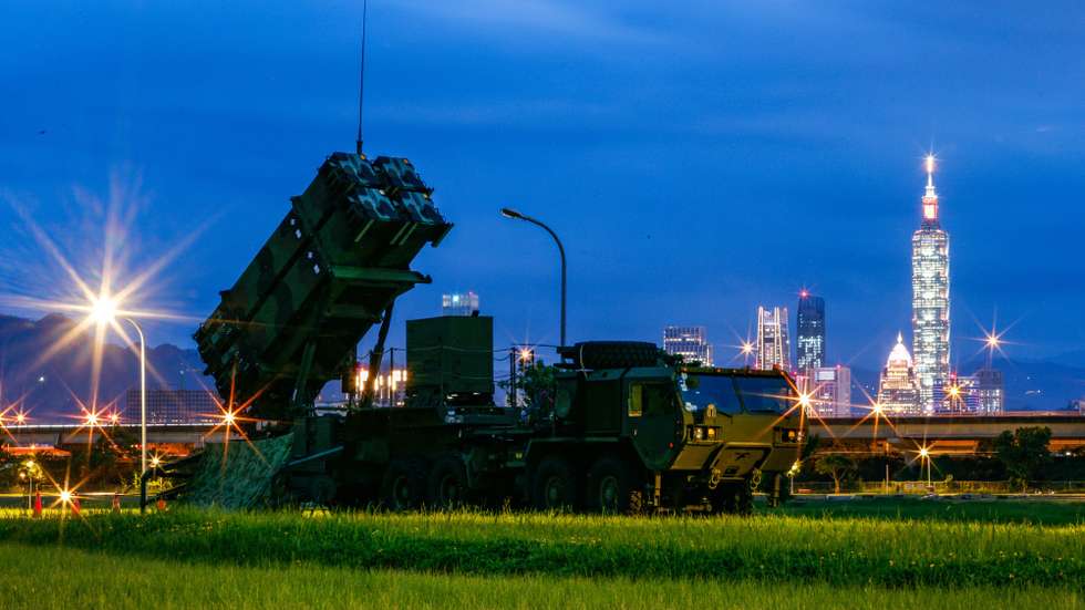 epa12239191 A long exposure photo shows Taiwan military Patriot air defense system deployed at a park as part of the annual Han Kuang military exercises, in Taipei, Taiwan, 15 July 2025. The Taiwanese Armed Forces began the annual Han Kuang exercises, large-scale military drills aimed at testing the troops' defensive capabilities in the event of a potential invasion by China. Han Kuang military exercises are scheduled between 09 and 18 July.  EPA/RITCHIE B. TONGO