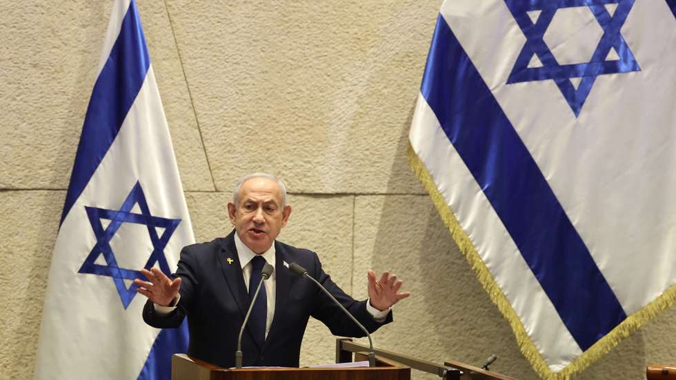 epa12516448 Israel's Prime Minister Benjamin Netanyahu speaks during a plenary session at the Knesset, the Israeli parliament in Jerusalem, 10 November 2025. The session has been initiated by the opposition demanding the establishment of a state inquiry conference to investigate the 07 October 2023 massacre.  EPA/ABIR SULTAN