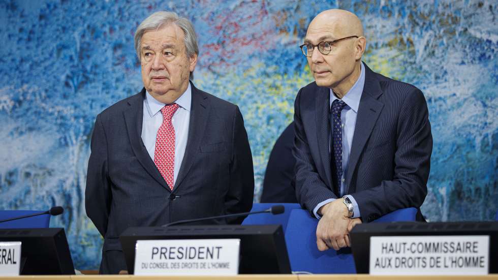 epa12770845 U.N. Secretary-General Antonio Guterres (L) and U.N. High Commissioner for Human Rights Volker Turk (R) talk prior to the opening of the 61st session of the United Nations Human Rights Council at the European headquarters of the United Nations in Geneva, Switzerland, 23 February 2026.  EPA/VALENTIN FLAURAUD