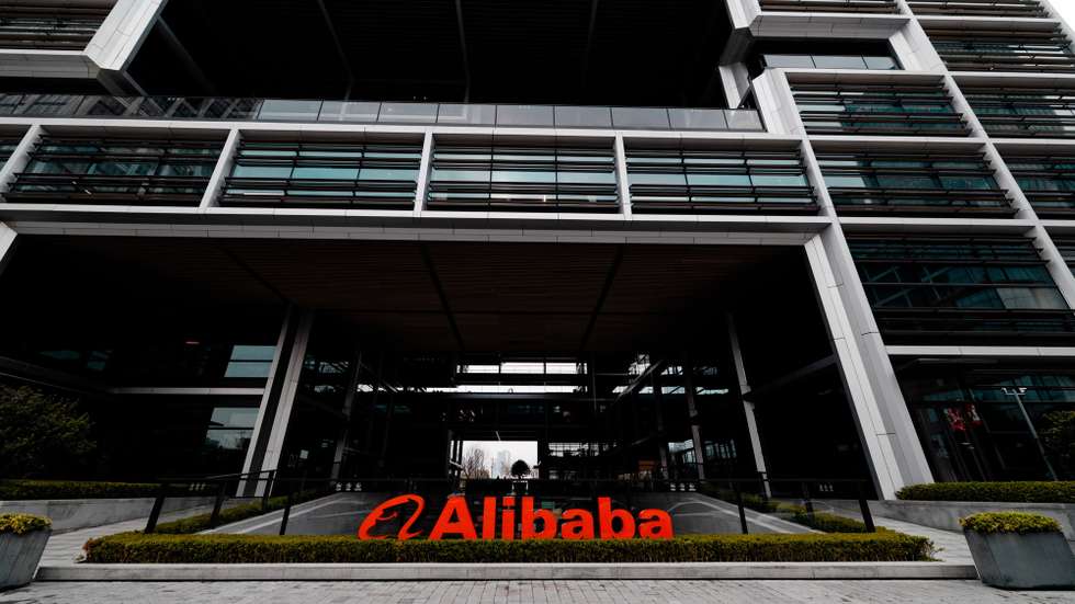 epa12832573 Alibaba logo stands on their building in Xuhuibinjiiang Park, also known as 'AI Park,' home to many Chinese companies involved in AI (artificial intelligence) research, in Shanghai, China, 19 March 2026.  EPA/ALEX PLAVEVSKI