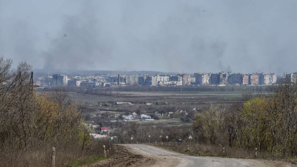 epa10567767 A general view on Bahkmut with smoke coming from the city in Bakhmut, Donetsk region, Ukraine, 10 April 2023. Russian troops entered Ukrainian territory on 24 February 2022, starting a conflict that has provoked destruction and a humanitarian crisis.  EPA/OLEG PETRASYUK